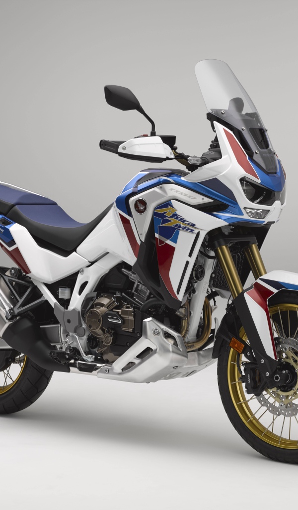 Мотоцикл Honda CRF1100L Africa Twin, 2021 года на сером фоне
