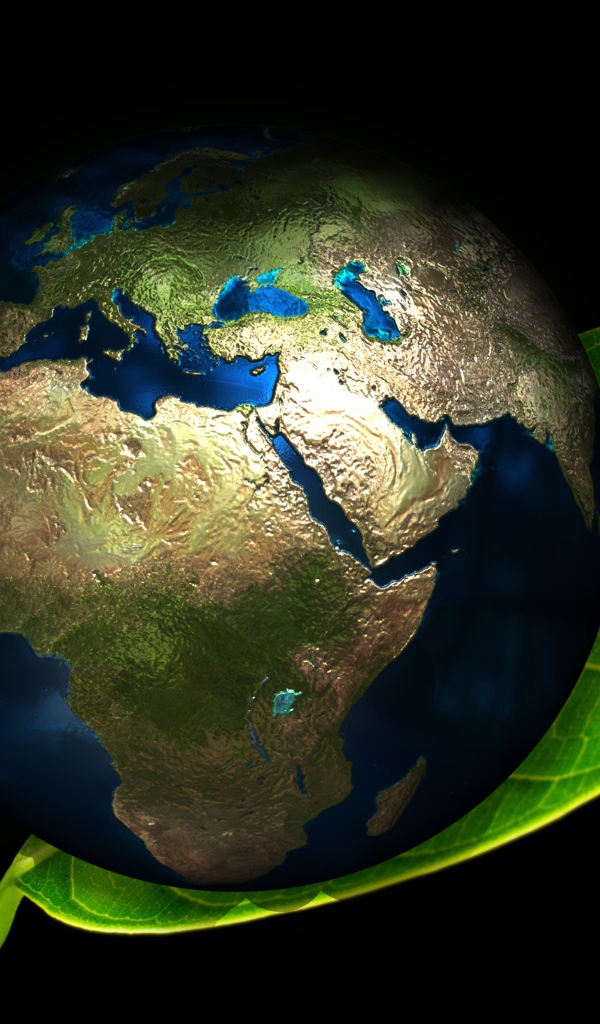 Планета Земля лежит на зеленом листе