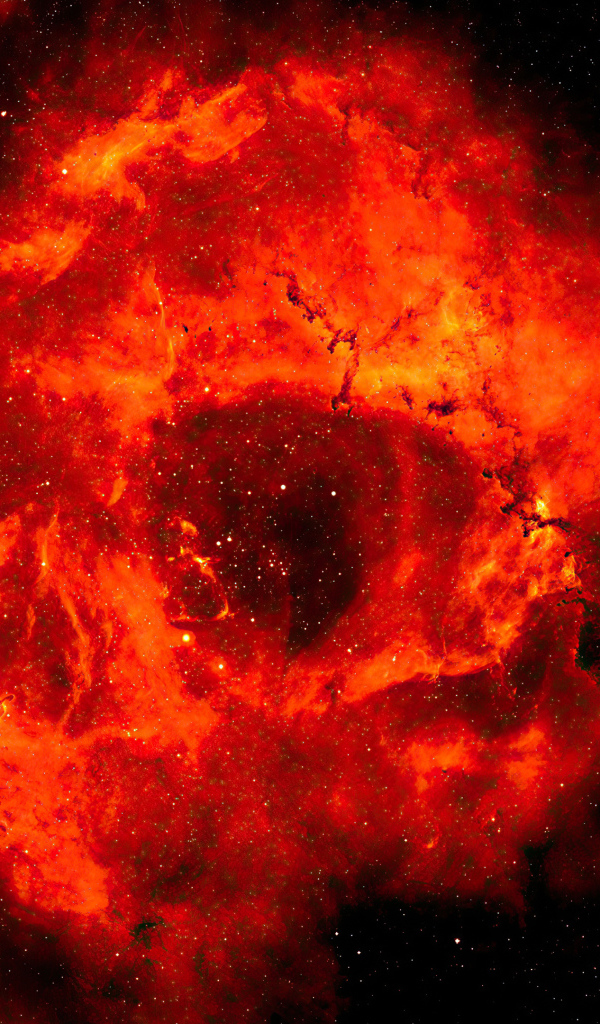 Красная туманность в космосе на черном фоне