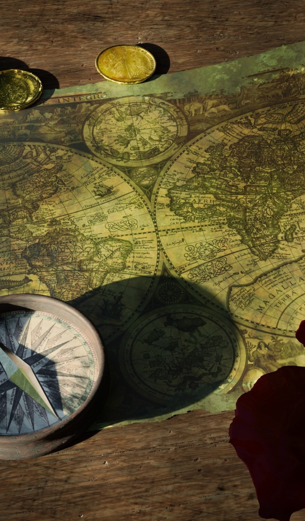 Старая карта с компасом и монетами