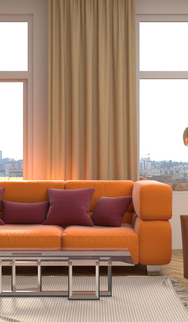 Большой оранжевый диван с подушками у окна 