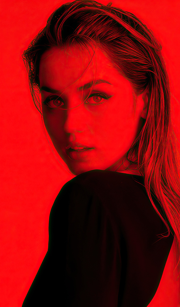 Испанская актриса Ана де Армас на красном фоне