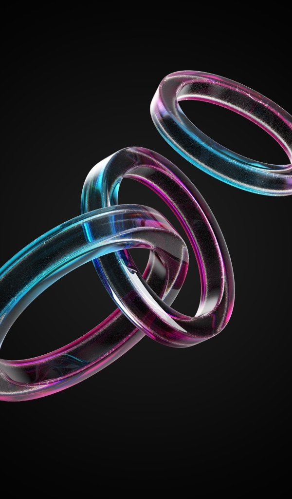 Стеклянные 3д кольца на черном фоне