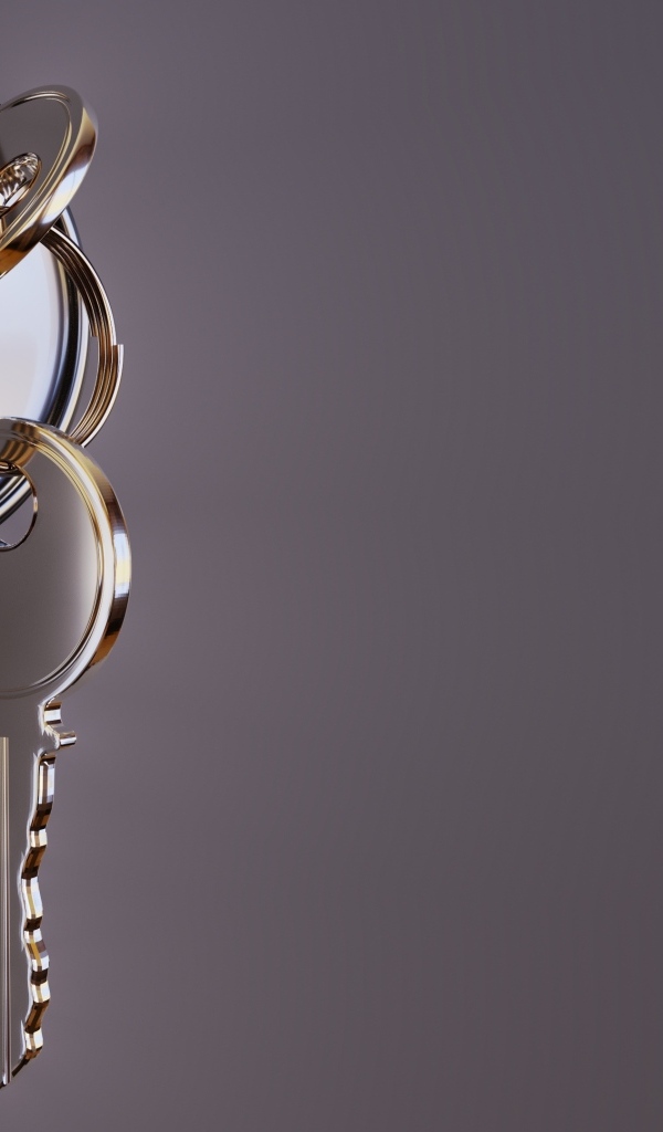 Ключ в замке на сером фоне