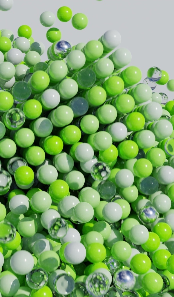 Много пластиковых и стеклянных зеленых шариков