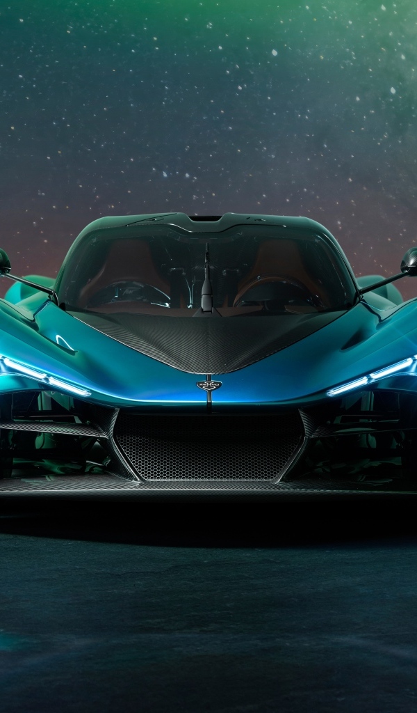 Вид спереди на дорогой автомобиль Zenvo Aurora Agil  ночью