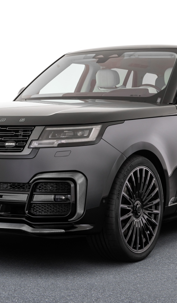 Внедорожник Brabus 600 2023 года на сером фоне