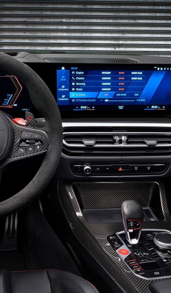 Черный салон автомобиля BMW M3 CS 2023 года