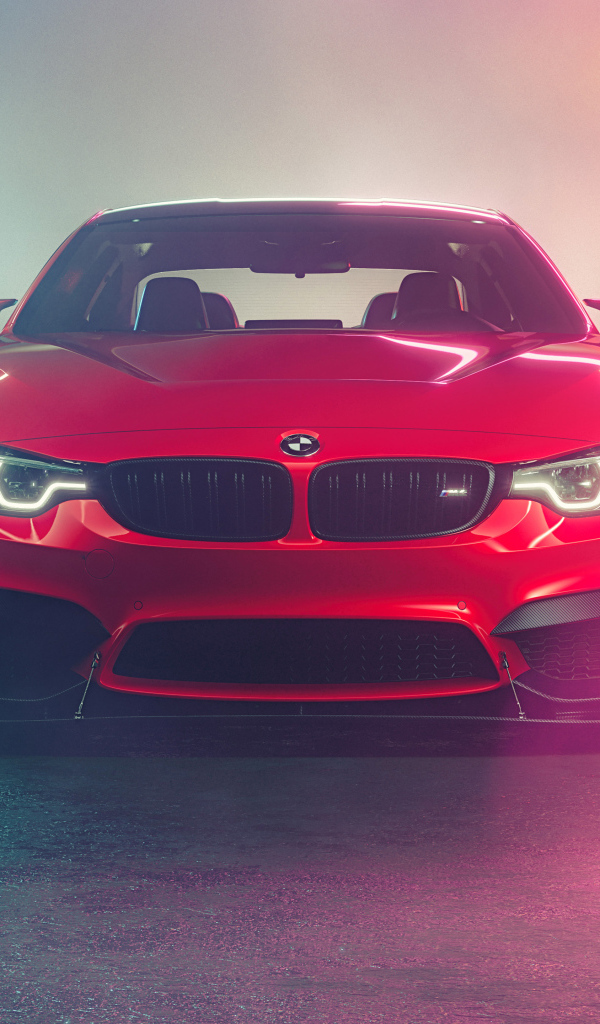 Красный автомобиль BMW M4  в дыму