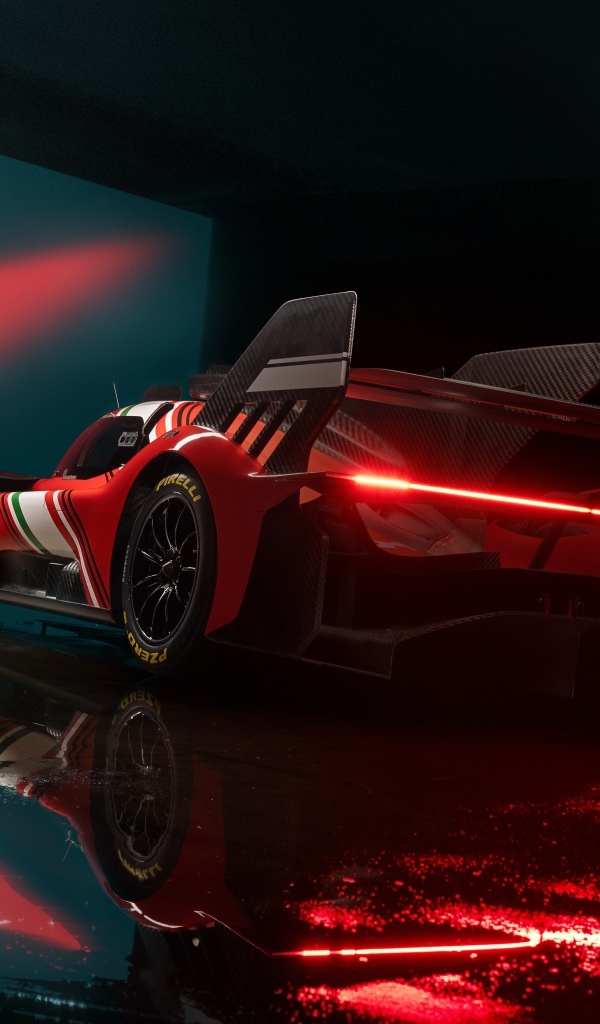 Красный спортивный автомобиль Ferrari 499P Modificata готовится к гонке