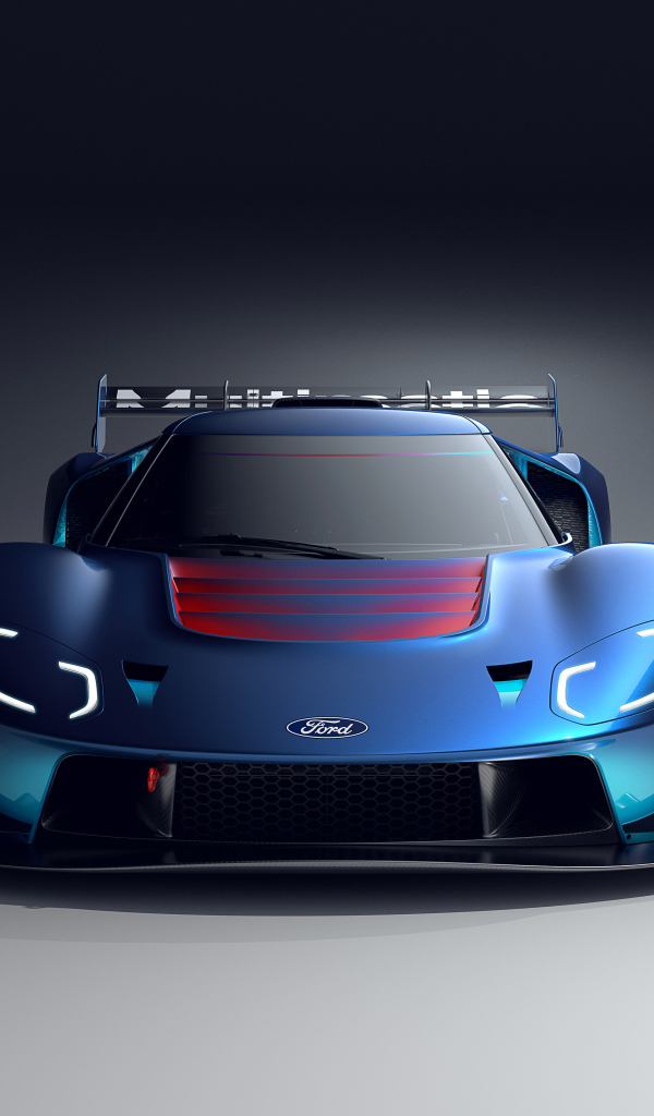 Синий автомобиль Ford GT MkIV 2023 на сером фоне