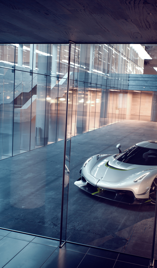 Автомобиль Koenigsegg Jesko у стекла