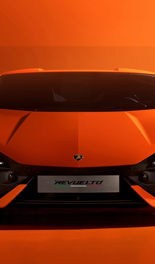 Автомобиль Lamborghini Revuelto 2023 на красном фоне