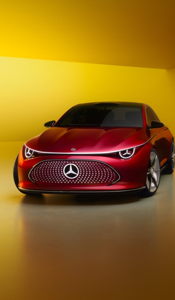 Красный автомобиль Mercedes-Benz Concept CLA Class 2024 года