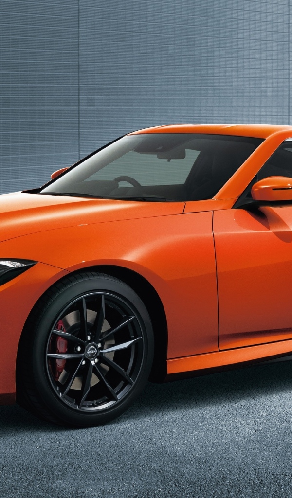 Оранжевый автомобиль Nissan Fairlady Z Version T