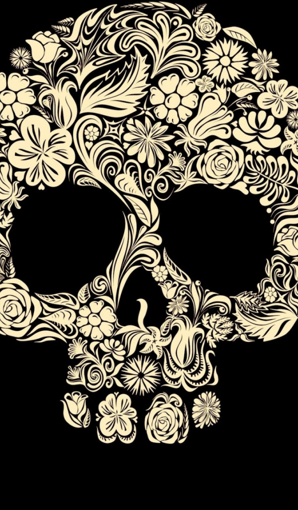 Череп из цветов на черном фоне