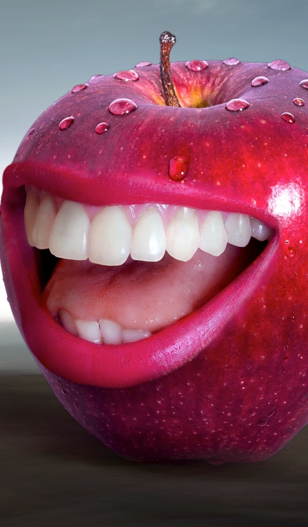 Красное яблоко с зубами