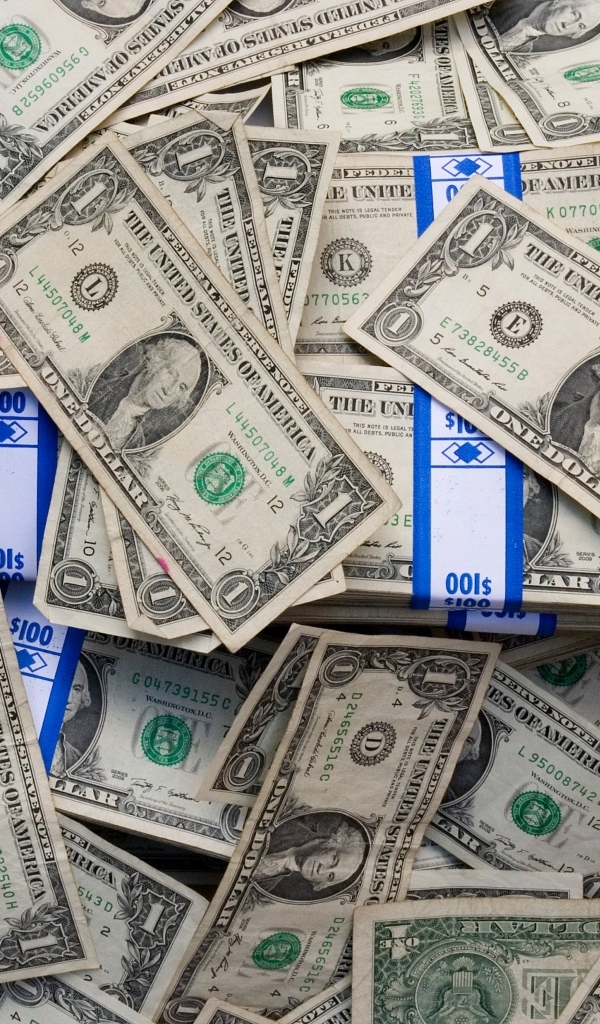 Много купюр в один доллар крупным планом