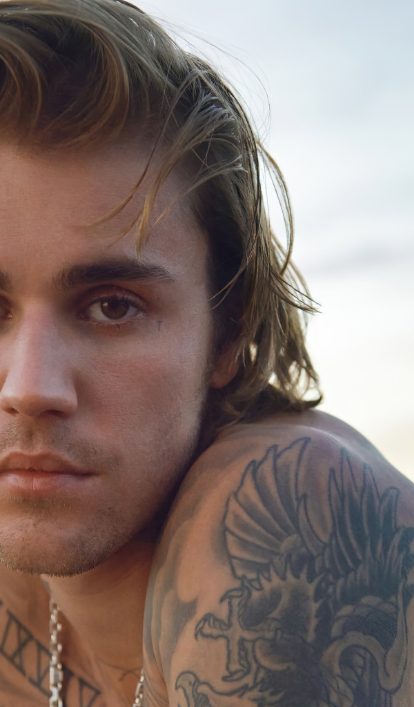 Молодой парень, певец  Джастин Бибер