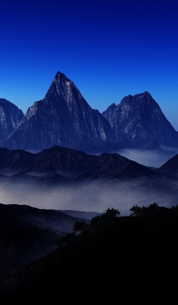 Три горные вершине в тумане