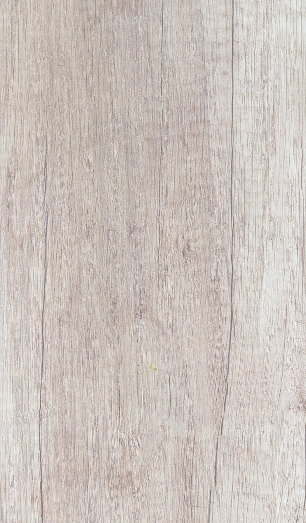 Зеленые листья на деревянном фоне