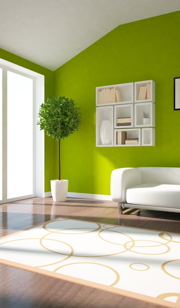 Зеленые стены в гостиной комнате с белым диваном