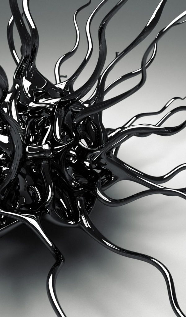 Черный металлический сплав на сером фоне