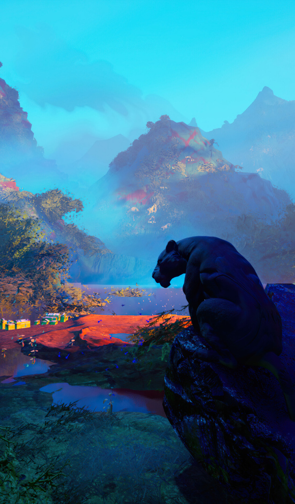 Большая черная пантера сидит на камне