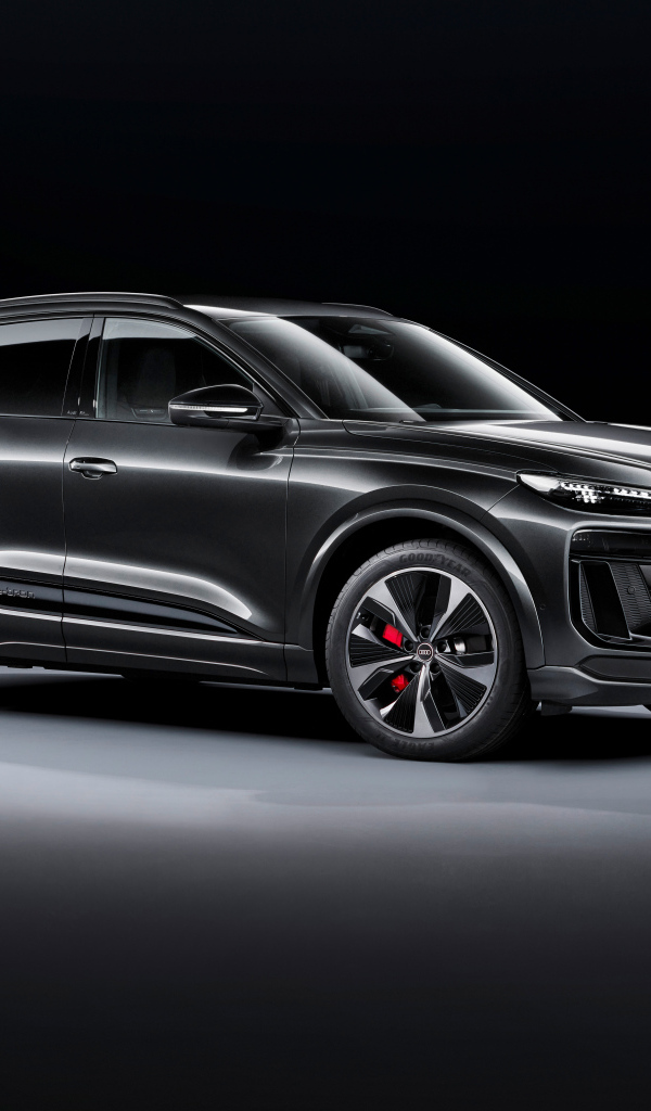 Презентация автомобиля  Audi SQ6 E-Tron 2024  года на черном фоне
