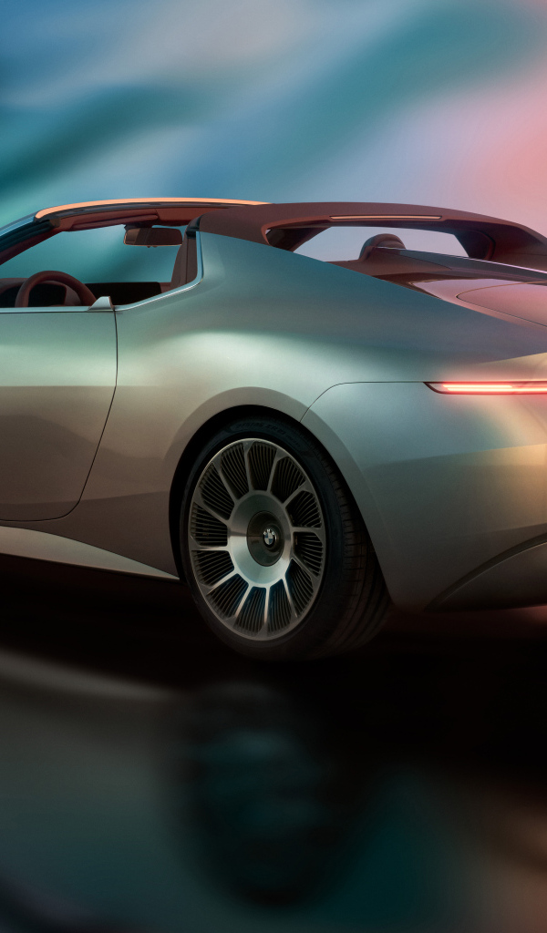 Вид сбоку на автомобиль  BMW Concept Skytop 2024