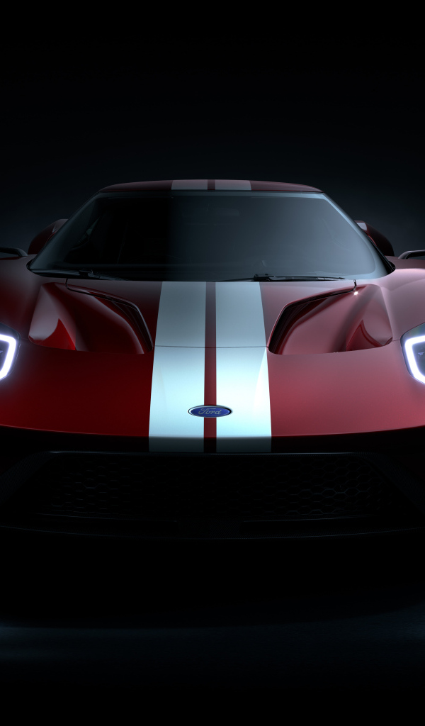 Автомобиль Ford GT на черном фоне
