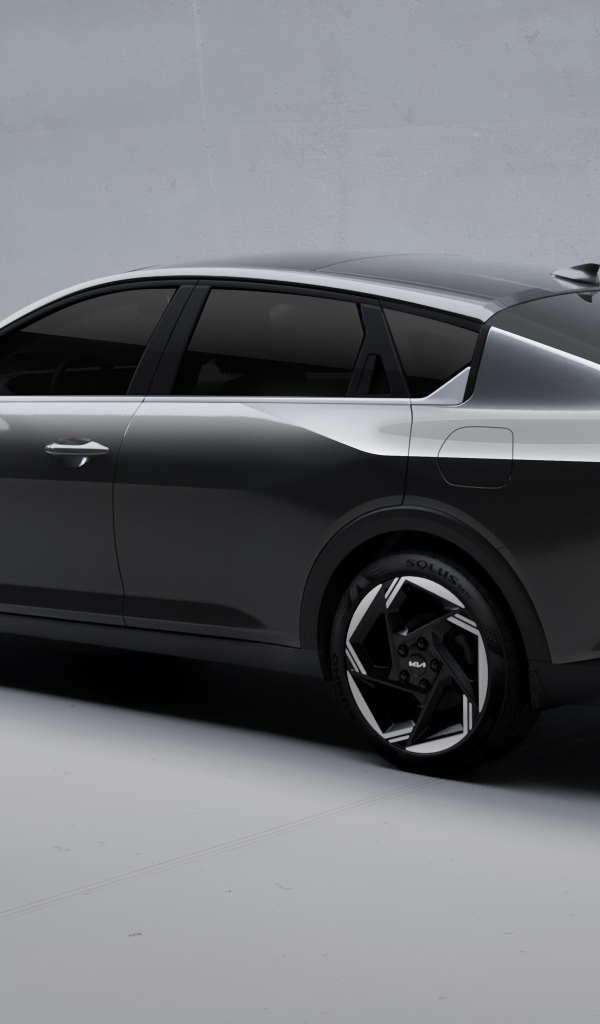 Черный автомобиль Kia K4 2025 года вид сзади