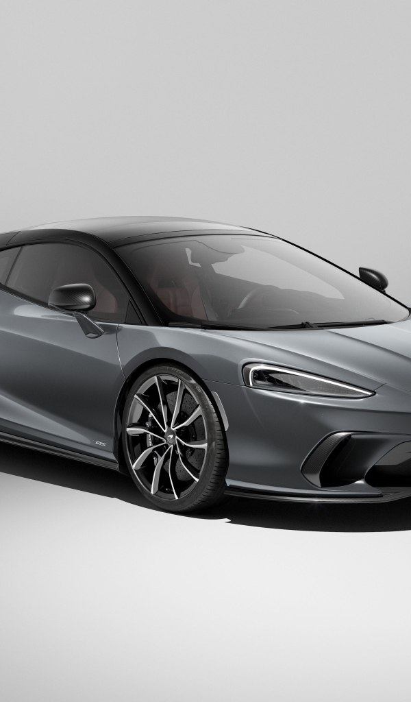 Серый автомобиль McLaren GTS