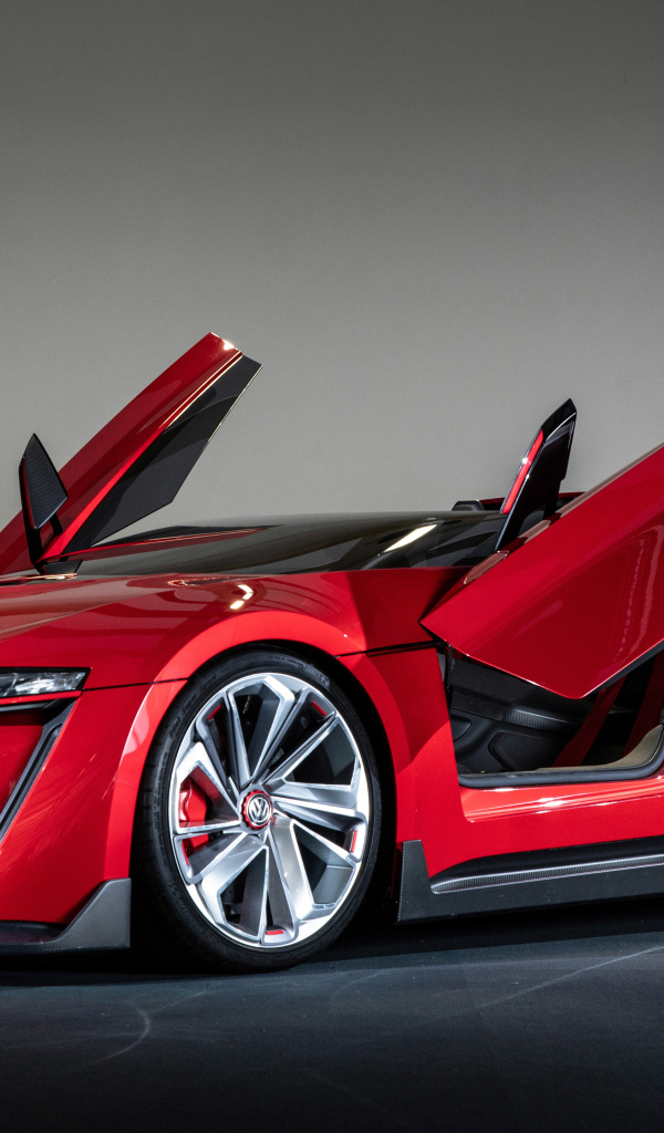 Красный кабриолет Volkswagen GTI Roadster с открытыми дверями