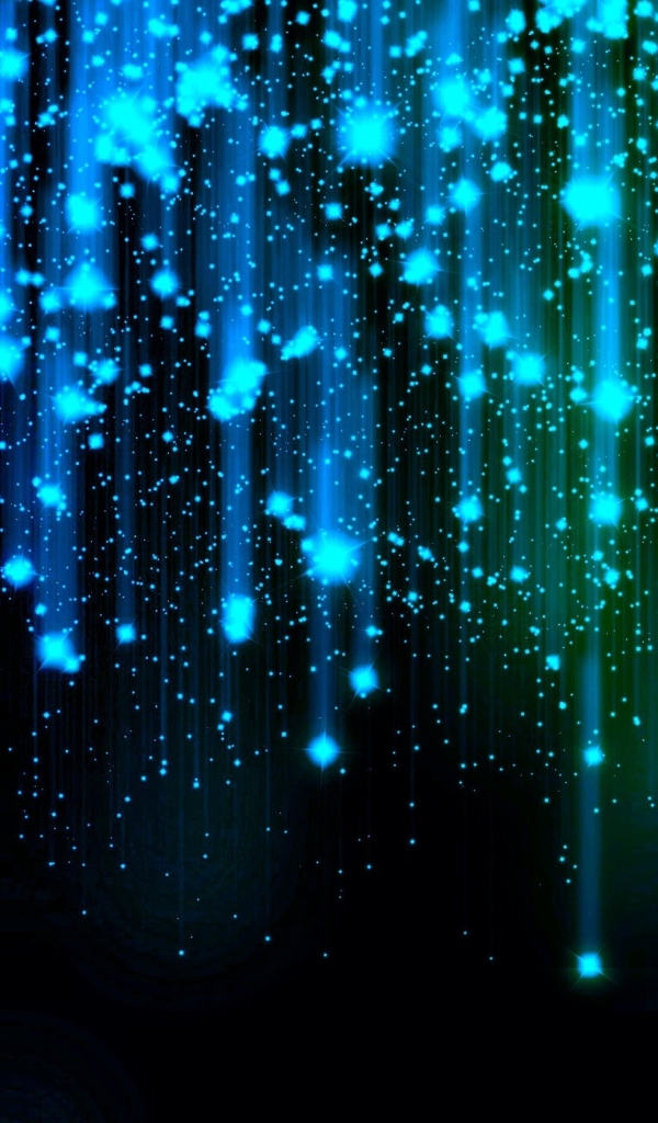 Яркие искры летят вниз на черном фоне