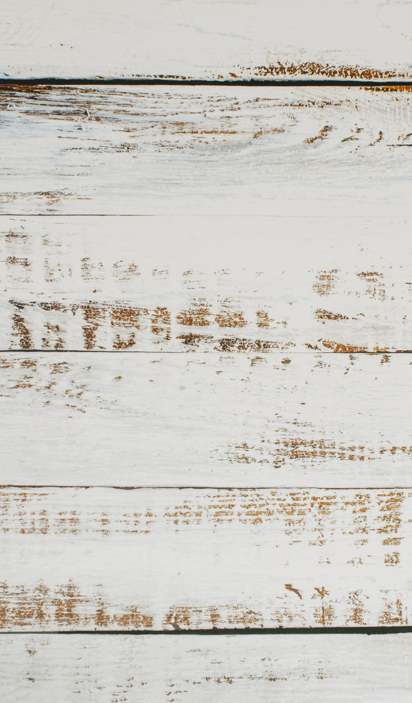 Окрашенная белой краской деревянная поверхность