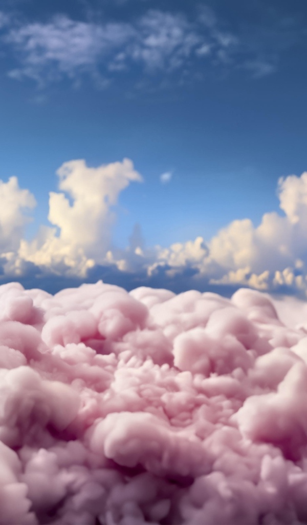 Розовый плюшевый медведь сидит на облаке