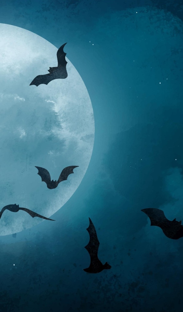 Огромная луна в небе и летучие мыши на праздник Хэллоуин