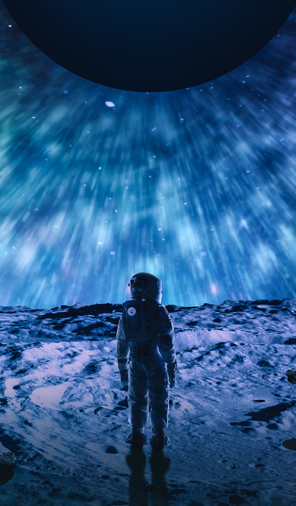 Астронавт на поверхности холодной  планеты 