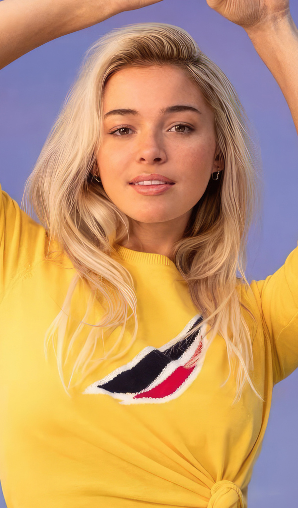 Гимнастка Ливви Данн на сиреневом фоне