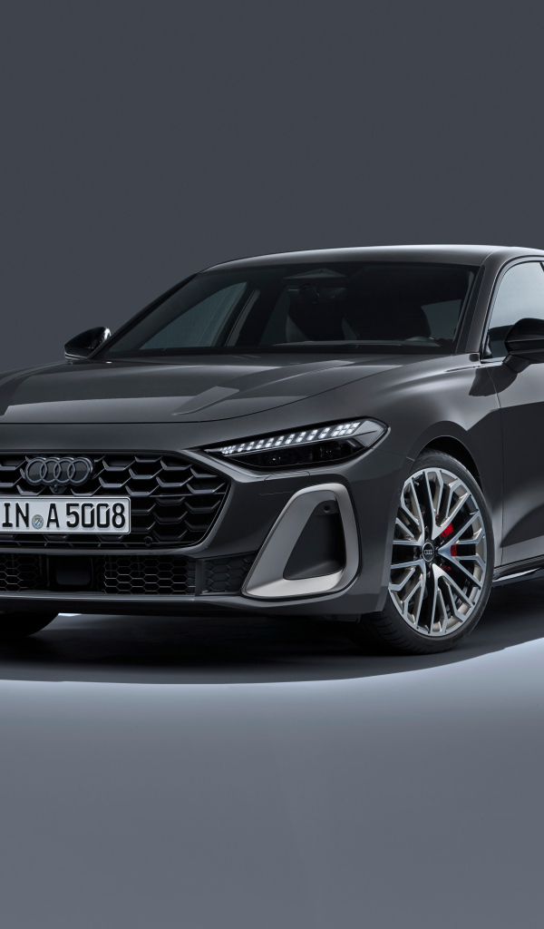Автомобиль Audi A5 TFSI quattro S line 2024 года на сером фоне