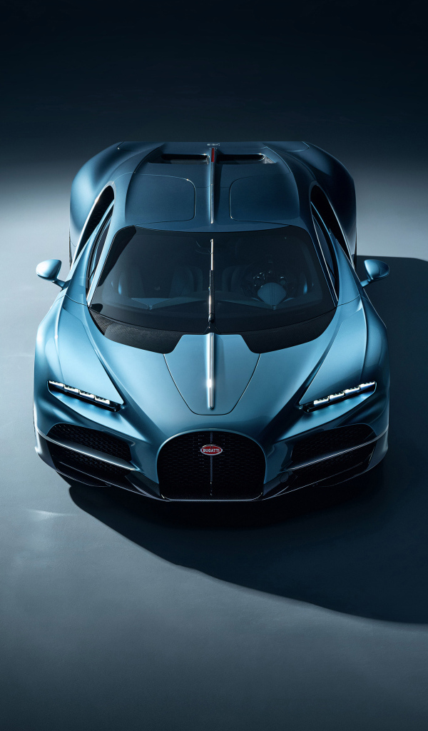 Автомобиль Bugatti Tourbillon 2024 года на сером фоне