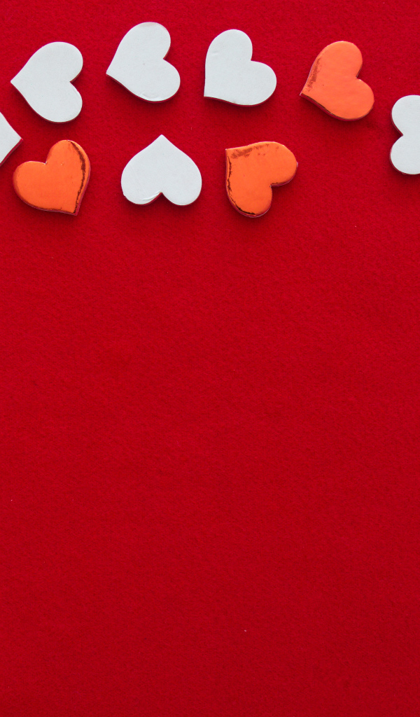 Красный фон для шаблона с маленькими сердечками