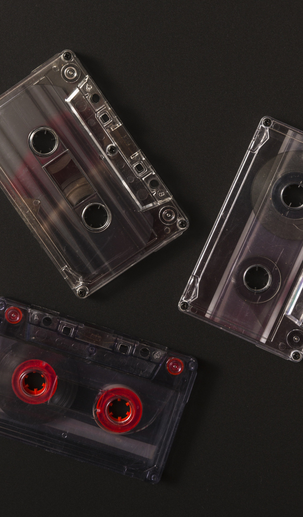 Три кассеты на черном фоне