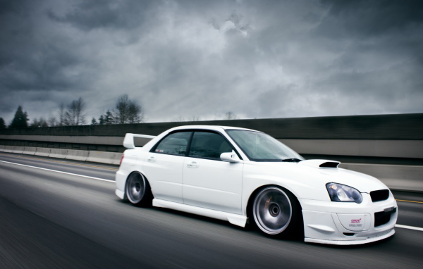 white Subaru Impreza STI