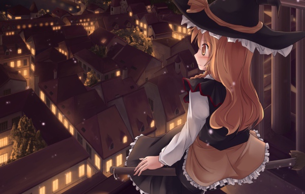 Девочка сидит на крыше