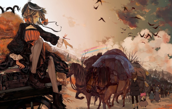 Девочка сидит на повозке