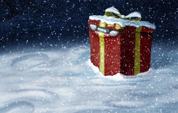 Медведь лезет из подарочной коробки на рождество