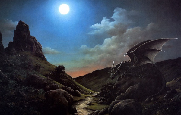 Дракон сидит на камне