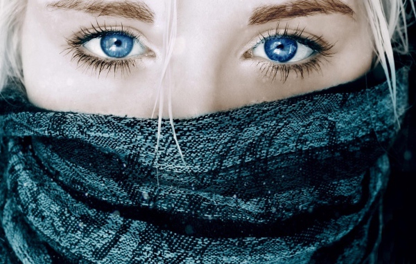 Blue eyes and a grey scarf